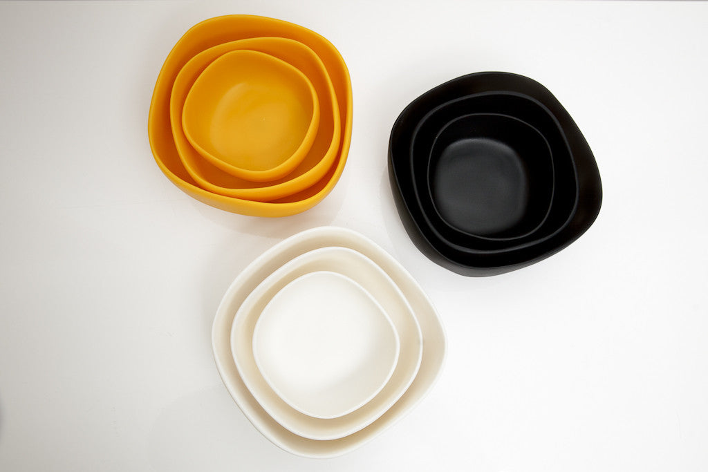 Yellow, Black, and White resin bowls